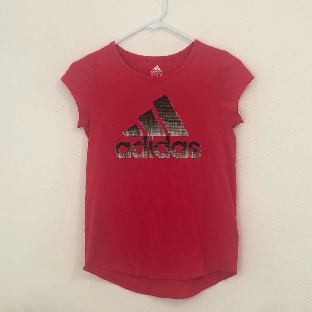 A pink adidas shirt in really good quality